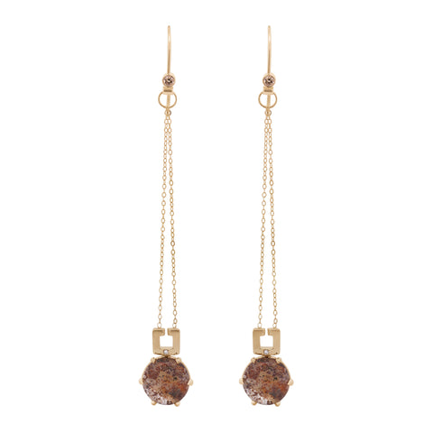  A pair of gold drop earrings featuring a round cabochon quartz with different red and brown tones on a white background
