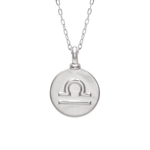 A 14mm charm with the Libra zodiac sign set in sterling silver on a sterling silver chain.