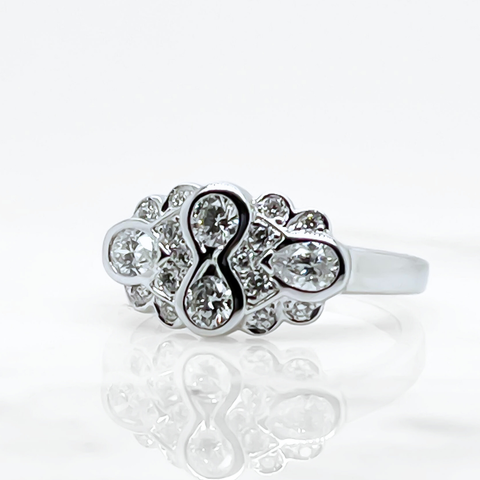 A multi diamond bezel ring set in white gold. 