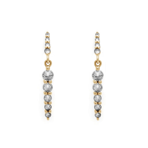 A pair of double pointe grey diamond drop earrings set in yellow gold.