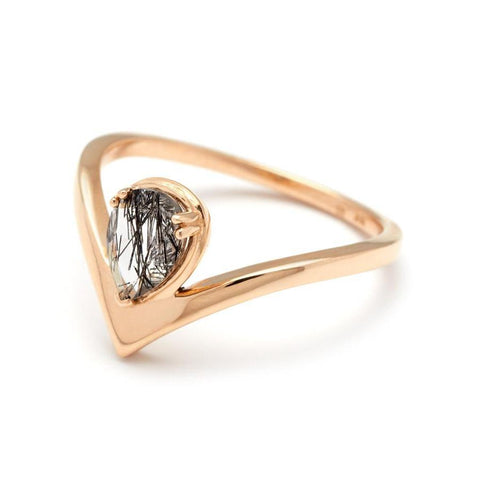 Angled view of a pear shaped ring with a black rutilated quartz center stone set in yellow gold., Yellow Gold 2