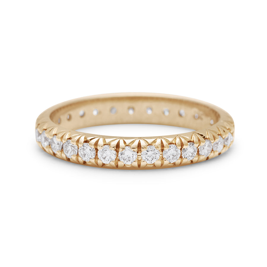 A yellow gold band with an eternity of round white diamond stones., Yellow Gold