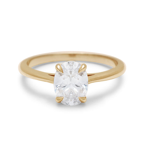 A solitaire brilliant cut oval 1.00ct white diamond set in yellow gold., Yellow Gold