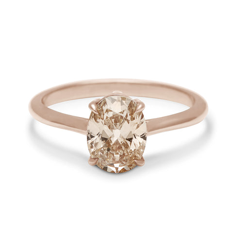 A solitaire oval champagne diamond set in rose gold., Rose Gold 3