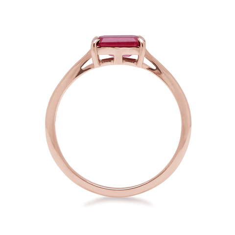Side view of an east/west solitaire ring with an emerald shape ruby stone set in rose gold., Rose Gold 3