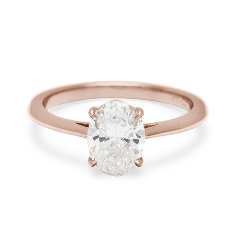 A solitaire oval brilliant cut 1.25ct white diamond set in rose gold., Rose Gold 7