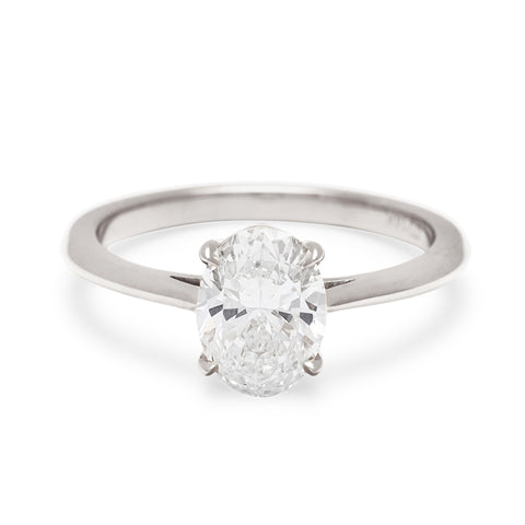 A solitaire oval brilliant cut 1.25ct white diamond set in white gold., White Gold 8