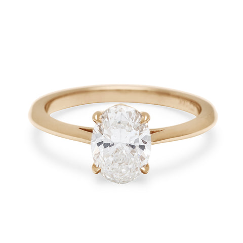 A solitaire oval brilliant cut 1.25ct white diamond set in yellow gold., Yellow Gold 5