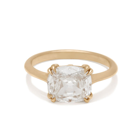 A north/south solitaire ring with an oval white diamond stone set in yellow gold., Yellow Gold