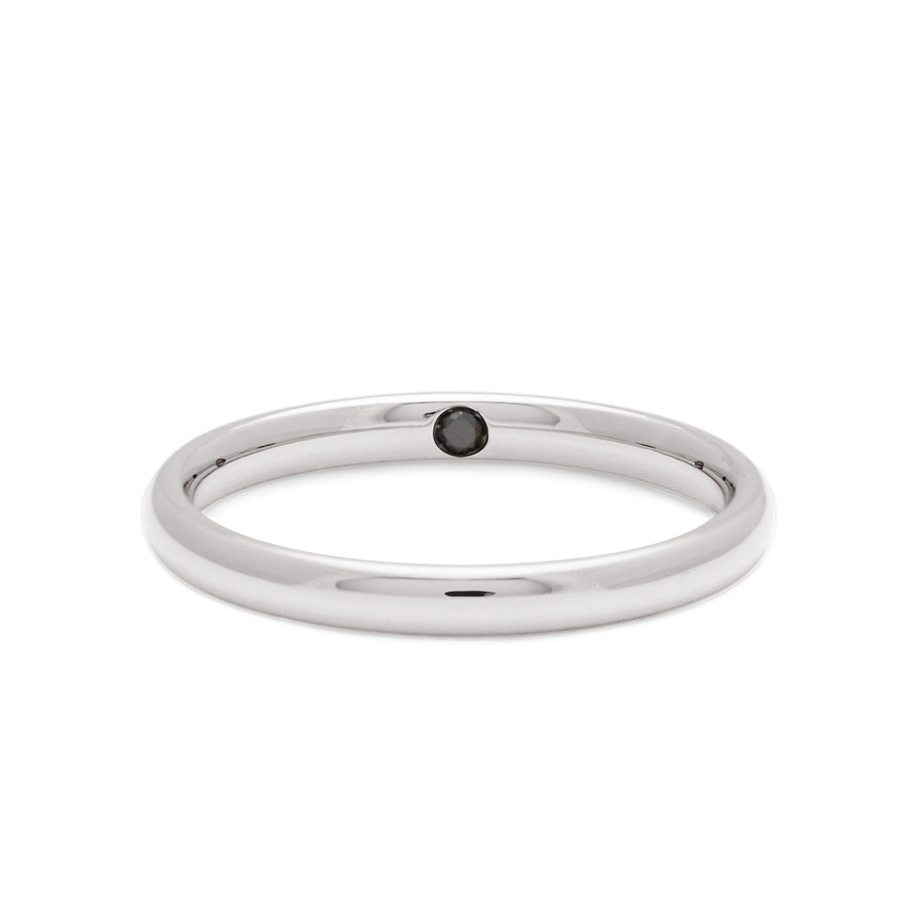 A 4mm classic round band with hidden black diamond set in white gold., White Gold
