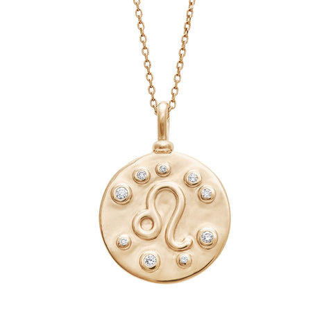 A 18mm charm with the Leo zodiac sign set in yellow gold with white diamond stones on a yellow gold chain.