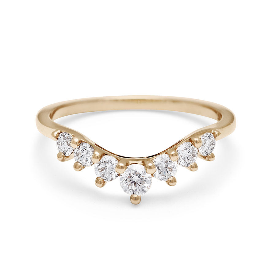 A curved 7 white diamond band set in yellow gold., Yellow Gold