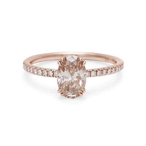 A solitaire oval champagne diamond ring with double claw prongs with white diamond pave on the band set in rose gold., Rose Gold 3