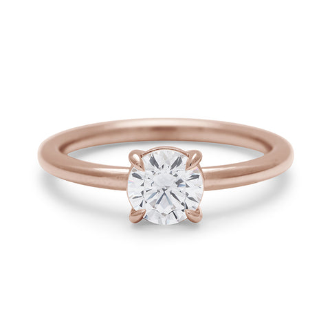 A solitaire round 0.75ct white diamond ring with claw prongs set in rose gold., Rose Gold 10