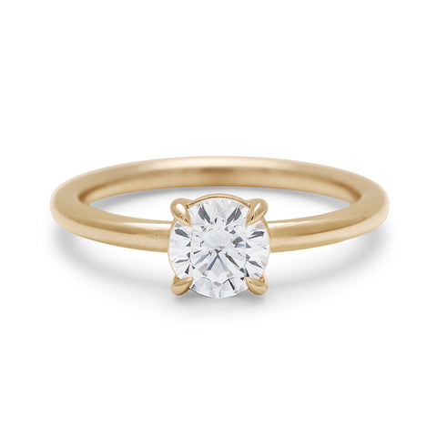 A solitaire round 0.75ct white diamond ring with claw prongs set in yellow gold., Yellow Gold 8