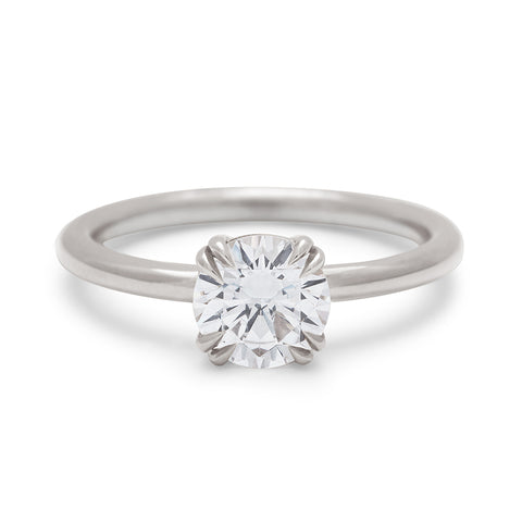 A solitaire round 1.00ct white diamond ring with double claw prongs set in white gold., White Gold 14