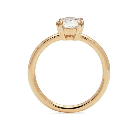 Side view of a solitaire round brilliant cut 1.50ct white diamond ring with double claw prongs set in yellow gold., Yellow Gold 4