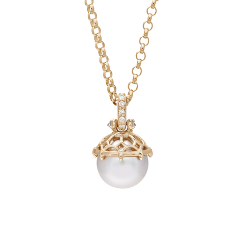 A one of a kind light pearl pendant with white diamond pave on the top and grey diamond accent stones on either side on a yellow gold chain.