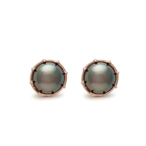 A pair of peacock pearl studs set in rose gold.