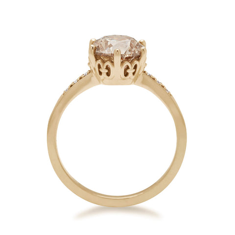 Side view of a solitaire ring with a round 1.50ct champagne diamond with white diamond pave on either side set in yellow gold., Yellow Gold 13
