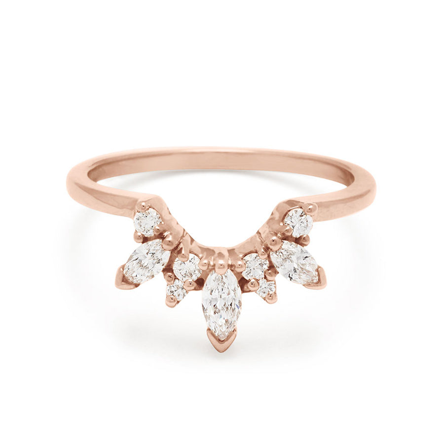 A band with three marquise shaped white diamonds with round white diamond set in rose gold., Rose Gold