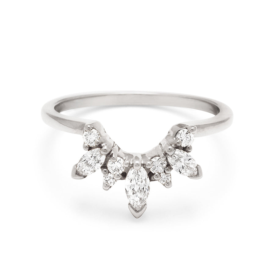 A band with three marquise shaped white diamonds with round white diamond set in white gold., White Gold