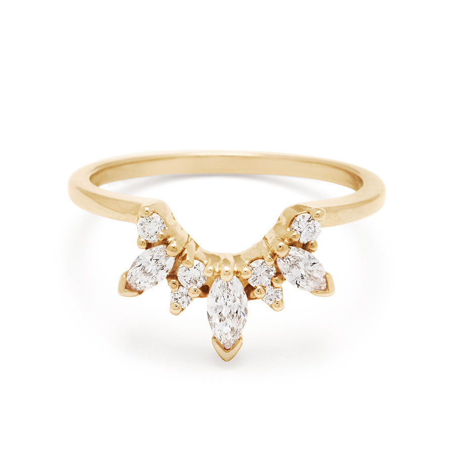 A band with three marquise shaped white diamonds with round white diamond set in yellow gold., Yellow Gold