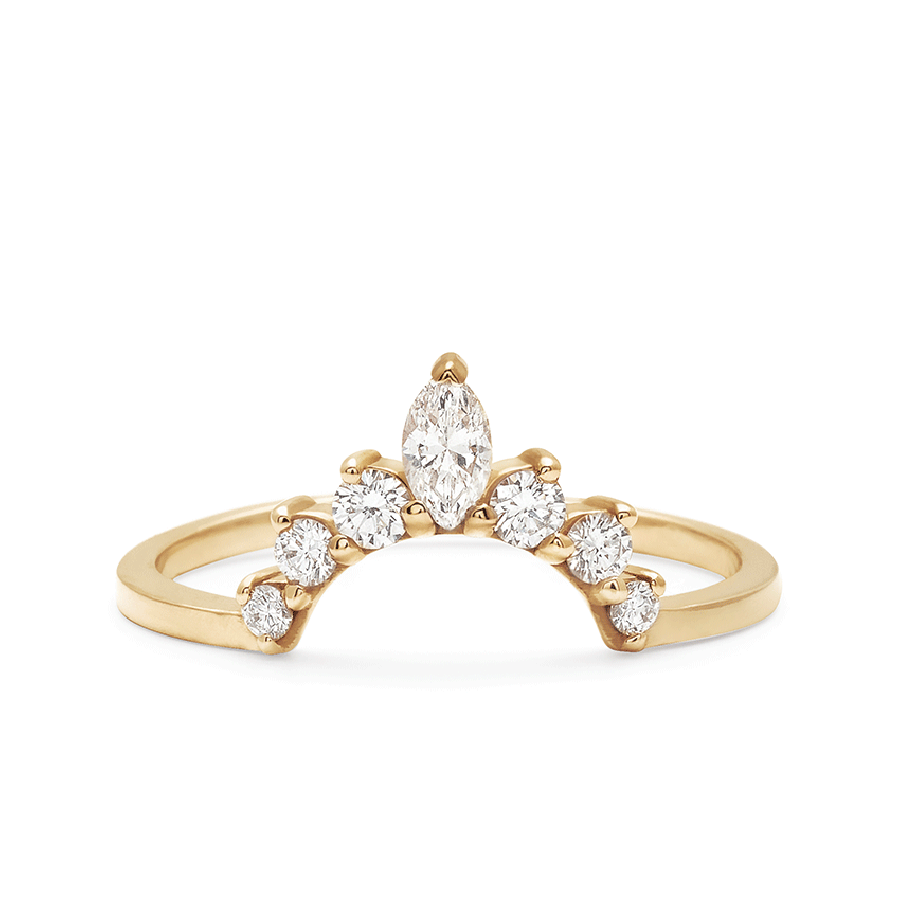 A curved band with three round white diamonds on either side of a marquise white diamond set in yellow gold., Yellow Gold