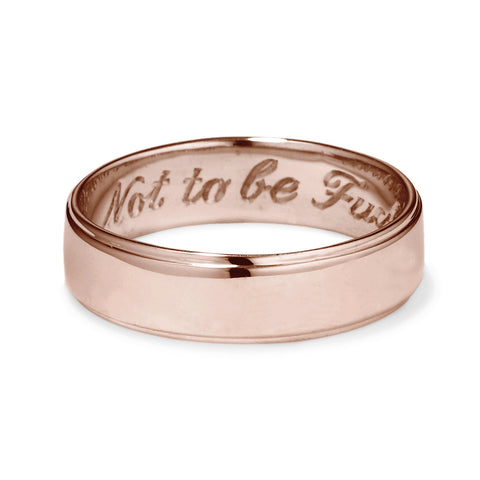 A rose gold flat edge band in 5mm with "Not to Be F**ked With" engraved on the inside., Rose Gold 3