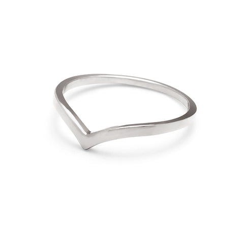 Angled view of a solid gold band in a pointed shape set in white gold. 10