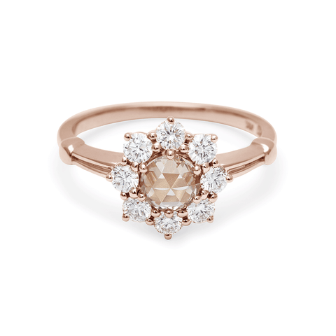 A cluster engagement ring with a white diamond center stone and champagne diamond side stones surrounding it set in 14k yellow gold., Yellow Gold