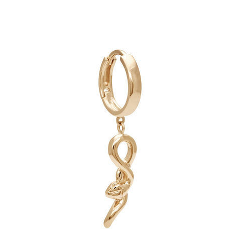 A hoop with a serpent attached set in yellow gold.