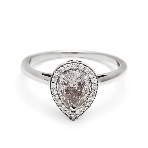 An engagement ring with a pear shape grey diamond center stone surrounded by a white diamond pave halo set in white gold., White Gold 4
