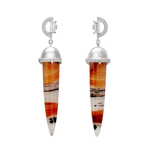 A pair of chalcedony drop earrings with a white diamond arc stud at the top set in white gold.