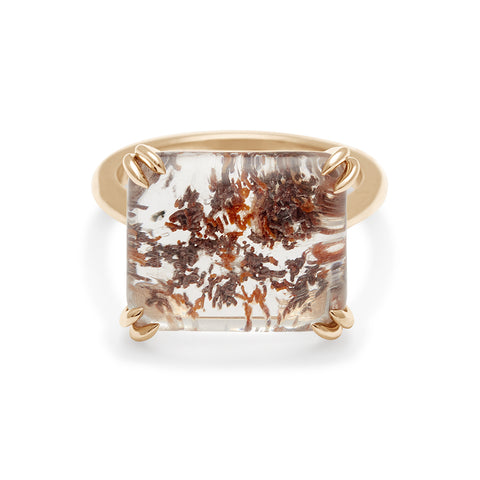 A square quartz solitaire ring set in yellow gold.