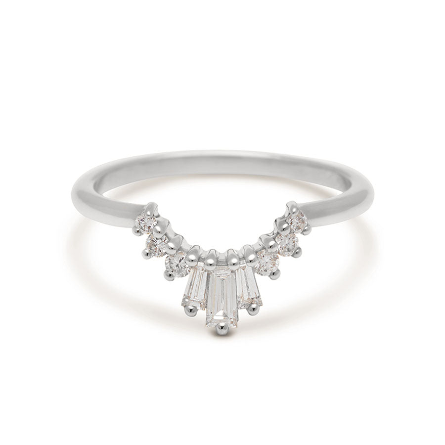 A three white diamond baguette band with three round white diamonds on either side set in white gold., White Gold