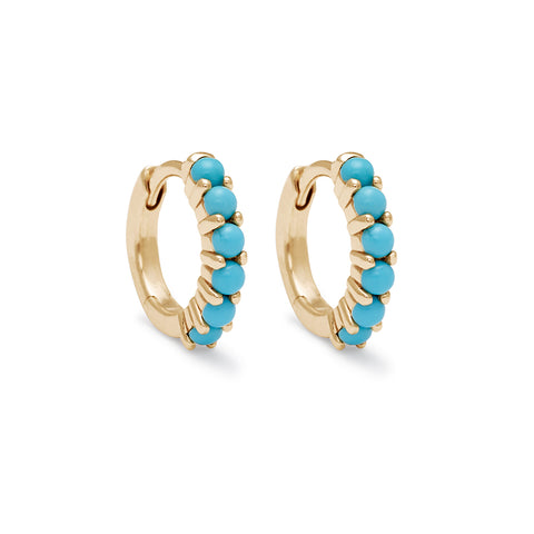 A pair of huggie hoops with turquoise stones set in yellow gold., Yellow Gold