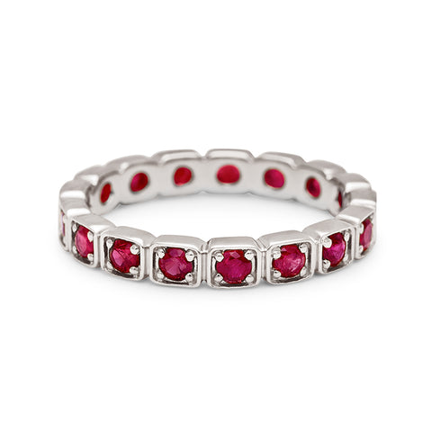 A 3mm straight band with rubies set in eternity around the band set in white gold., White Gold 3