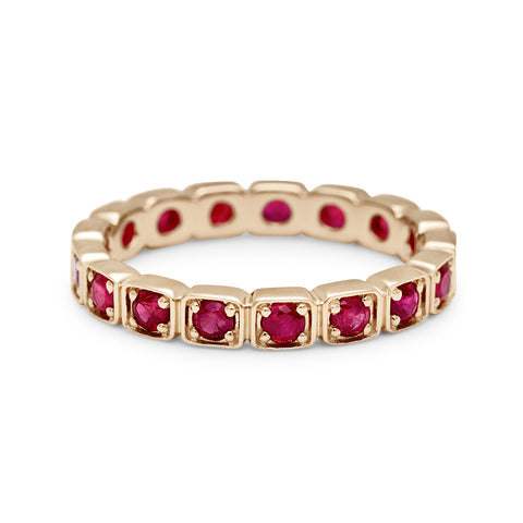A 3mm straight band with rubies set in eternity around the band set in yellow gold., Yellow Gold