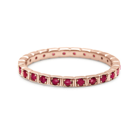 A straight band with rubies set in eternity around the band set in rose gold., Rose Gold 2