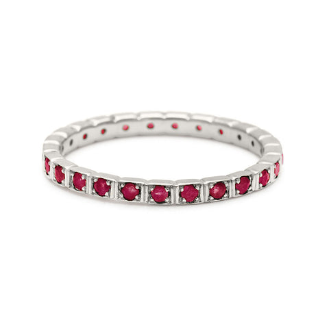 A straight band with rubies set in eternity around the band set in white gold., White Gold 3