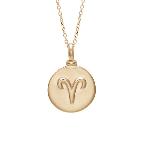 A 14mm charm with the Aries zodiac sign set in yellow gold on a yellow gold chain.