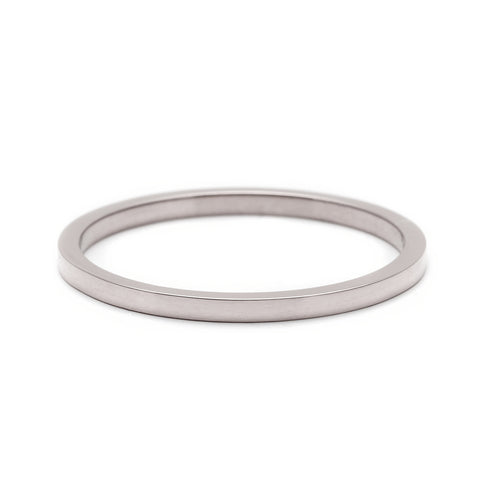 A 1.5mm flat band set in white gold., White Gold 3