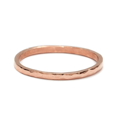A 1.5mm flat band with a hammered finished set in rose gold., Rose Gold 5