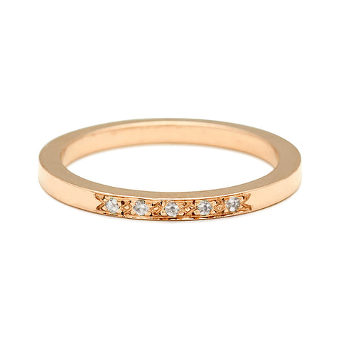 A flat band with 5 white diamonds set in the center in yellow gold., Yellow Gold