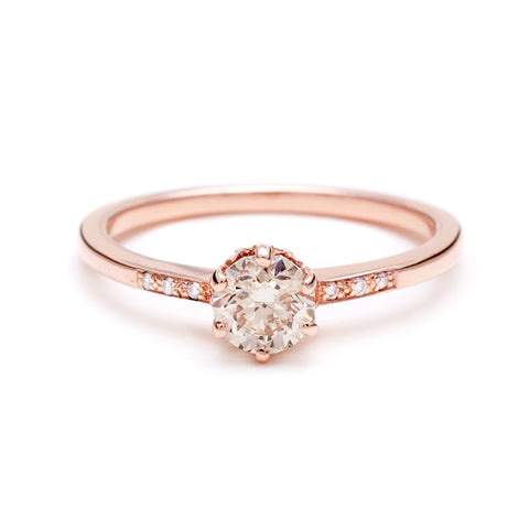 A solitaire ring with a brilliant cut 0.50ct champagne diamond with white diamond pave on either side set in rose gold., Rose Gold 2