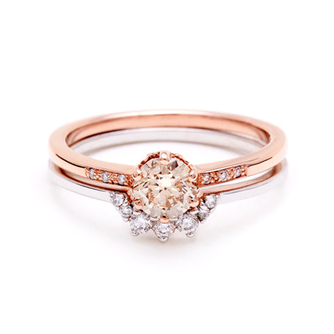 A solitaire ring with a round 0.50ct champagne diamond with white diamond pave on either side set in rose gold stacked on top of a 7 white diamond curve band set in white gold., Rose Gold, Yellow Gold 5