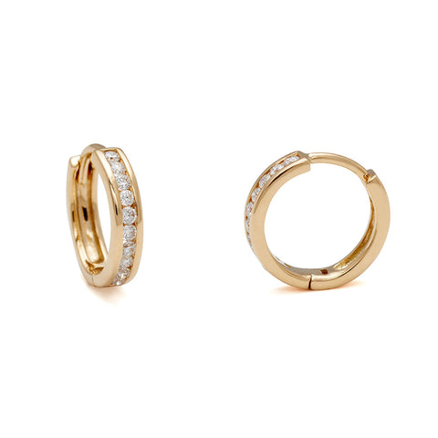 A pair of hoops with a line of white diamonds set in yellow gold one earring turned to the side., Yellow Gold 4