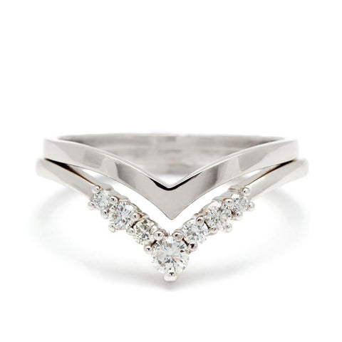 A pointed shape in solid gold stacked above an ascending size white diamond nesting band both in white gold. Available in Yellow Gold, Rose Gold, White Gold. 7